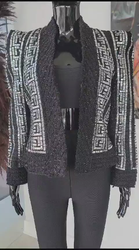 Veste à épaules bouffantes en tweed avec strass